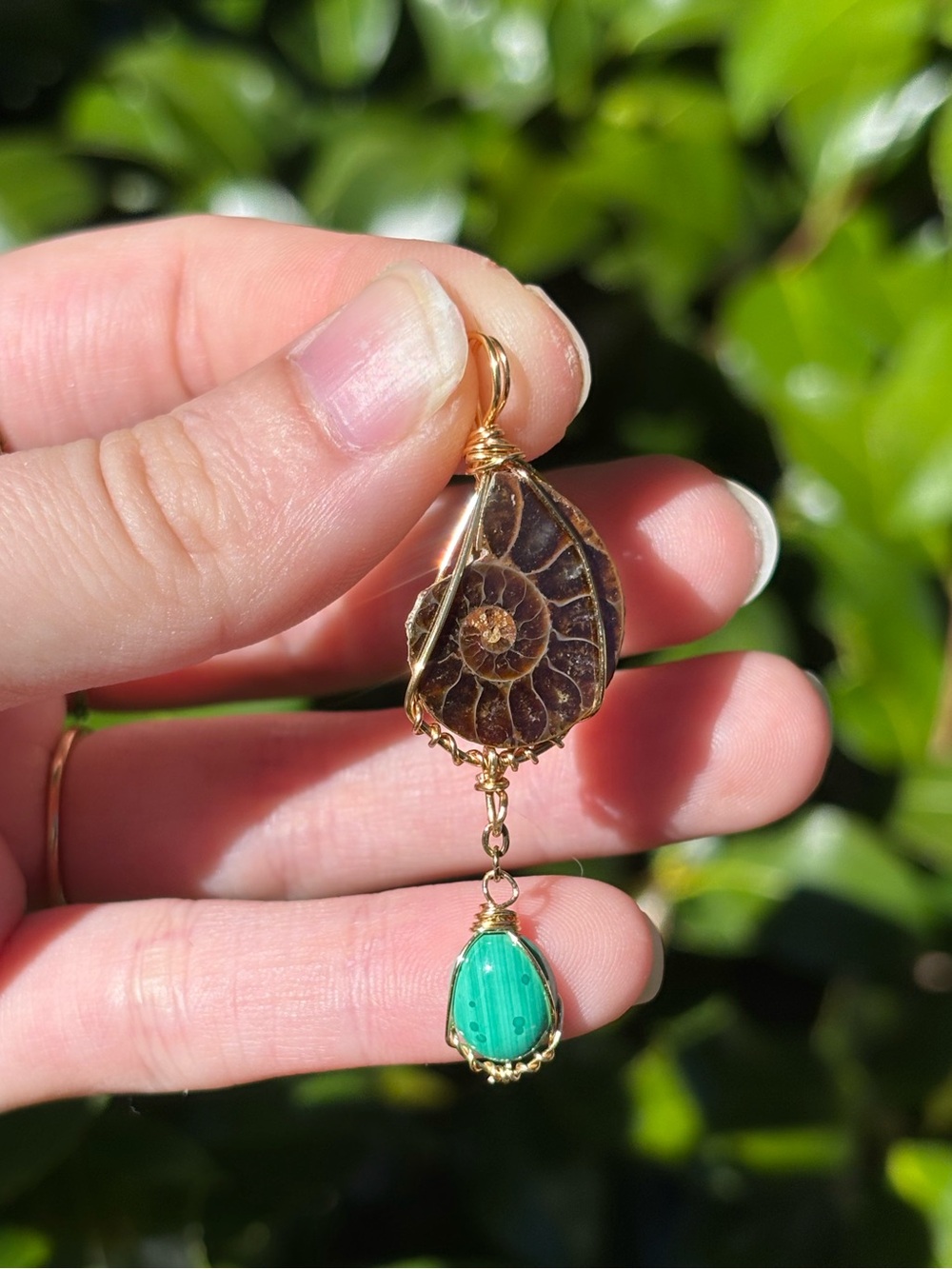 Ammonite and malachite pendant